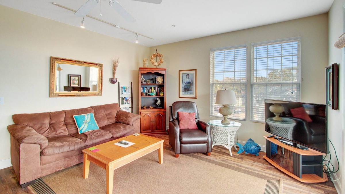 Folly Beach Condo | First-floor villa w/partial ocean views, covered porch -one block from the beach
