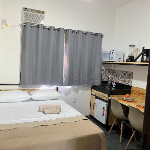 Jardim Ipe Apartment | Flat com ar e varanda com linda vista para o Ibituruna - Vôo Livre 203