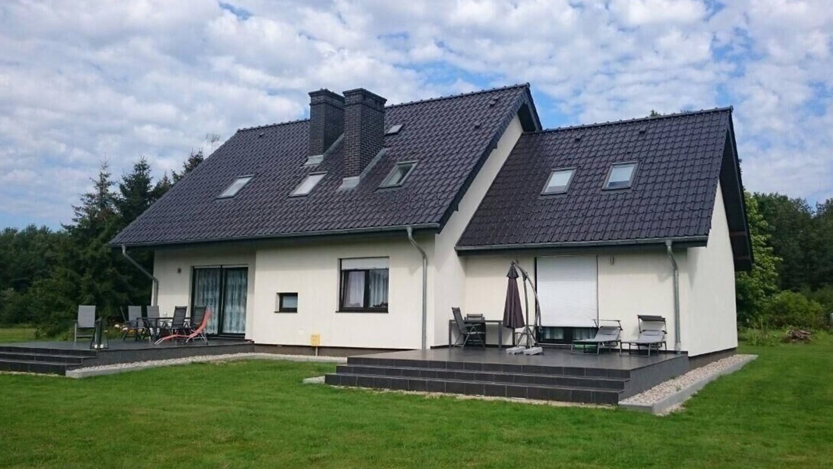 Gietrzwald Apartment | Flat in Naterki with terrace, garden and barbecue