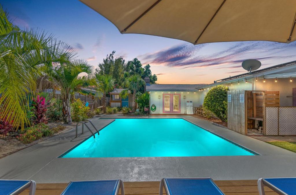 Upper Grand Lagoon House | Flirty Flamingo with Private Heated Pool, Game Room, and AMAZING Covered Outdoor Living