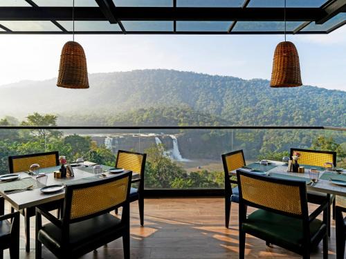 Perumbavoor Resort | Flora Misty Falls Athirappilly