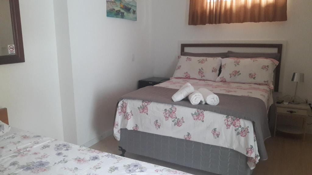 Muquem House | Florianópolis Suites confortáveis