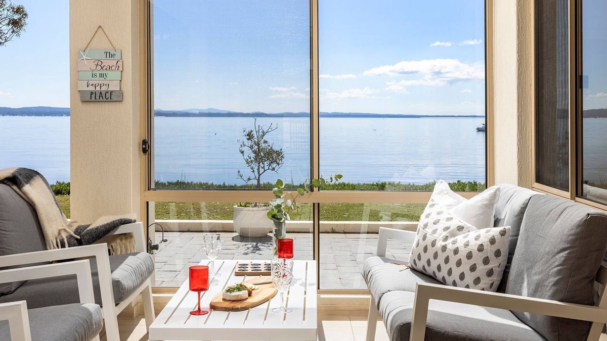 Salamander Bay House | Foreshore Delight offers a tranquil holiday retreat with breathtaking water views