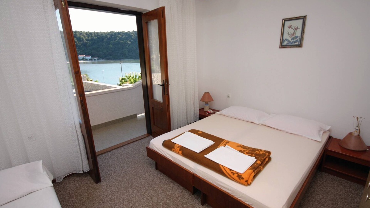 Kampor Apartment | Four-bedroom apartment with terrace and sea view Kampor, Rab (A-5051-a)