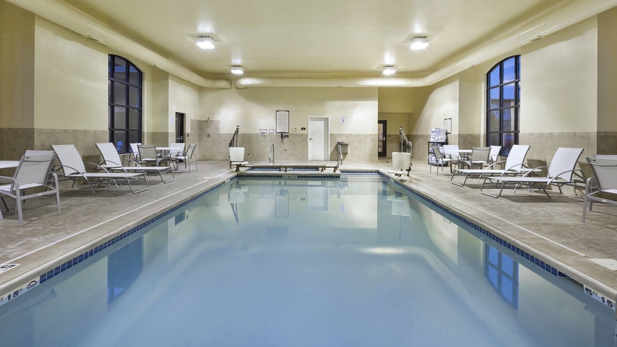 Okemos Condo | Free Breakfast Buffet. Near Michigan State University.