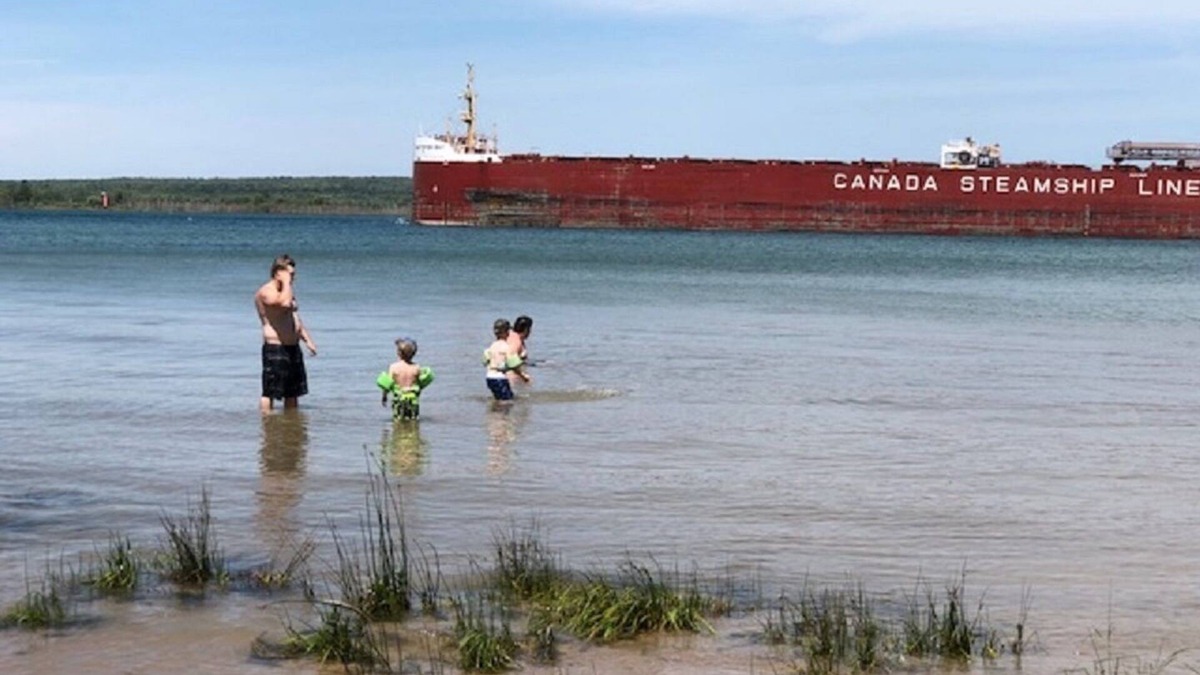 Sault Ste. Marie House | Freighters in front yard! Private Sandy Beach - Large Deck - Best View on River