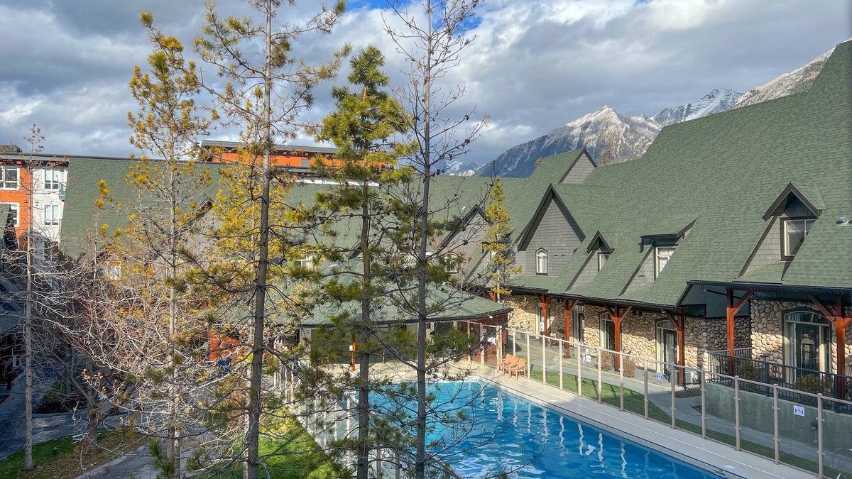 Canmore House | Full Mountain Chalet facing HEATED POOL and HOT TUB!