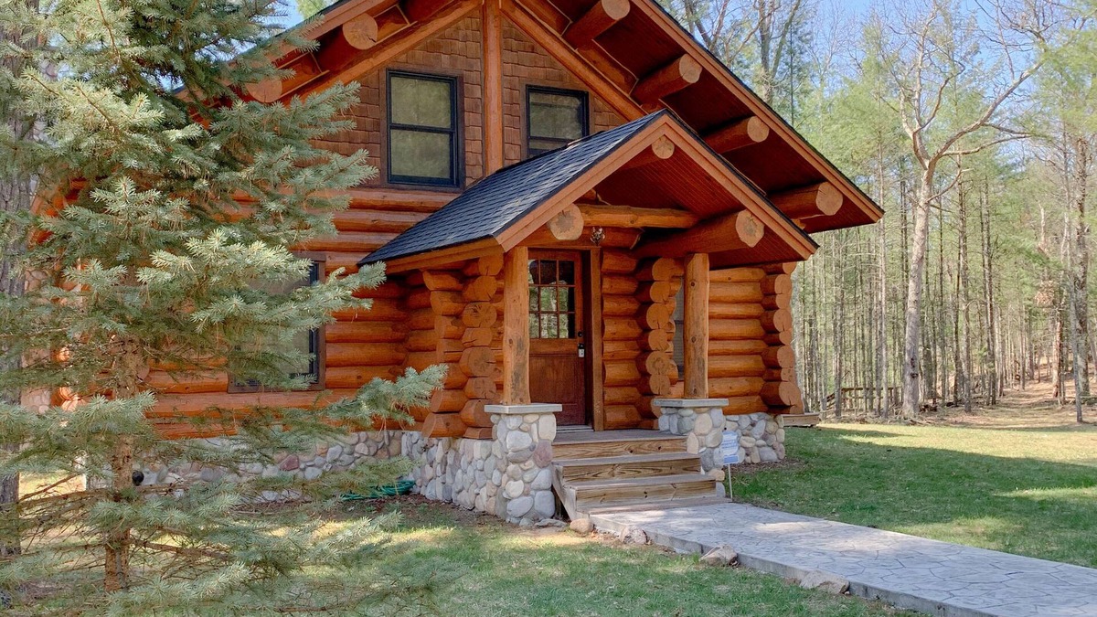 Baldwin Cabin | Full Scribed Log Cabin Nestled in along the banks of the Pere Marquette