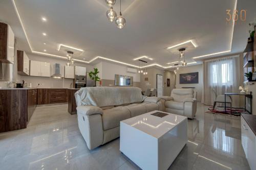 Qawra Apartment | Fully equipped 2BR home with Pool & Gym access by 360 Estates