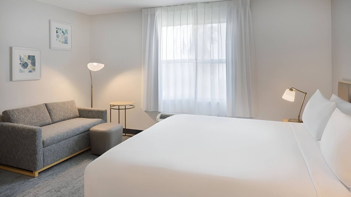 Westshore Hotel | Fully Equipped Kitchen in Modern Suite with Airport Shuttle and Swimming Pool