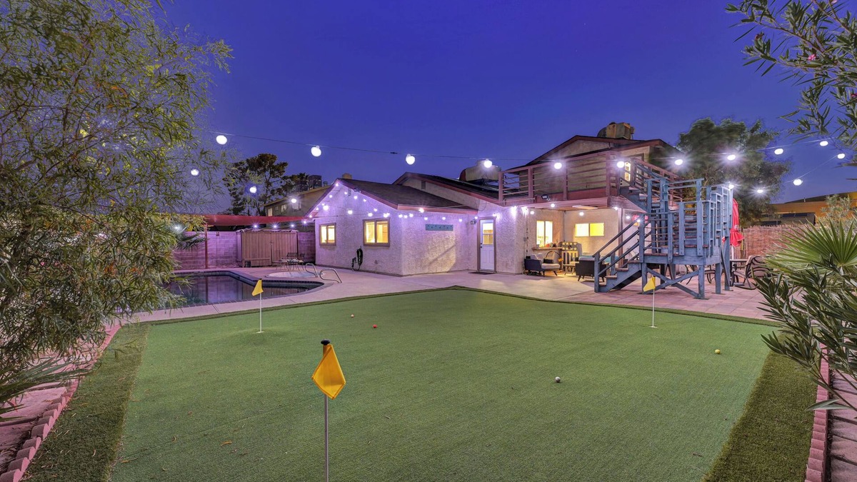 Chinatown House | Fun five bedroom home by the strip. pool, putting green, games, karaoke!