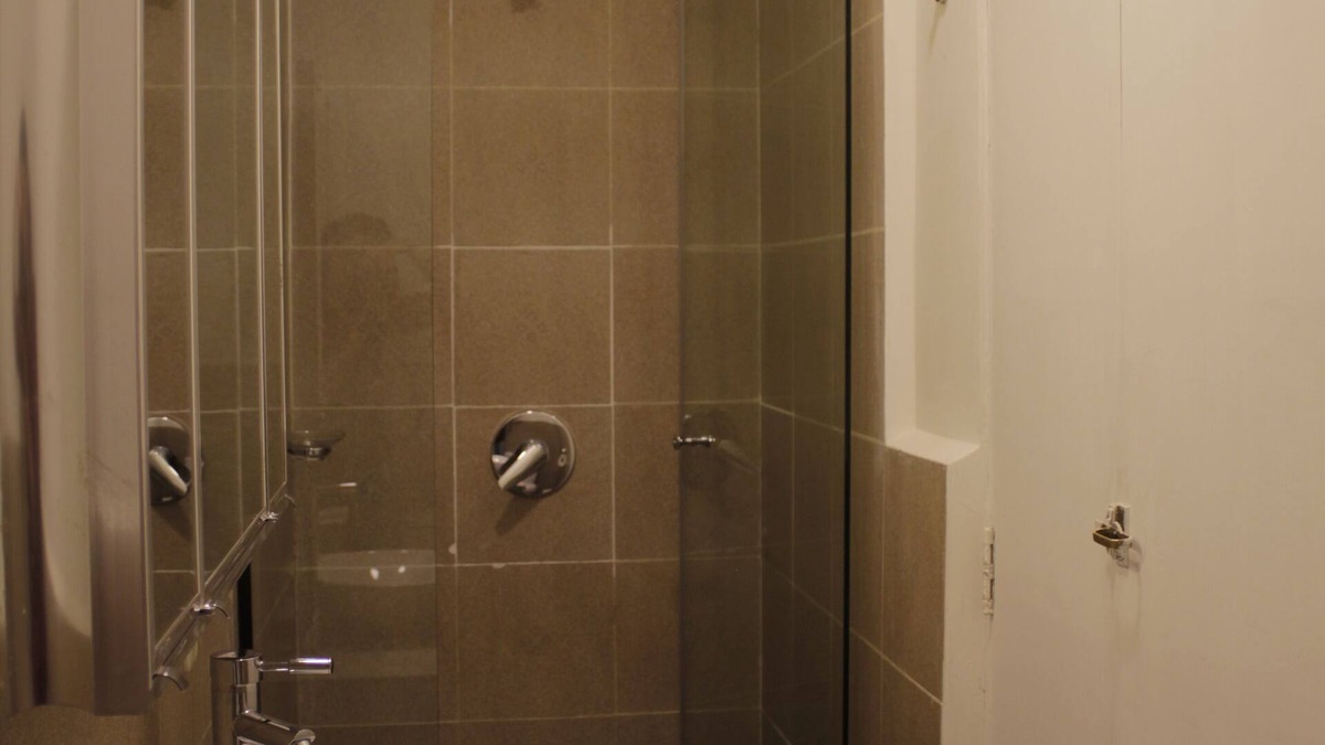 Downtown La Paz Apartment | Garden and fireplace, bedroom suite