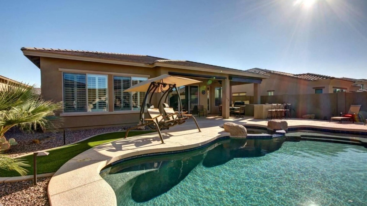 Estrella Mountain Ranch House | Gated Golf Course community with beautiful backyard oasis!