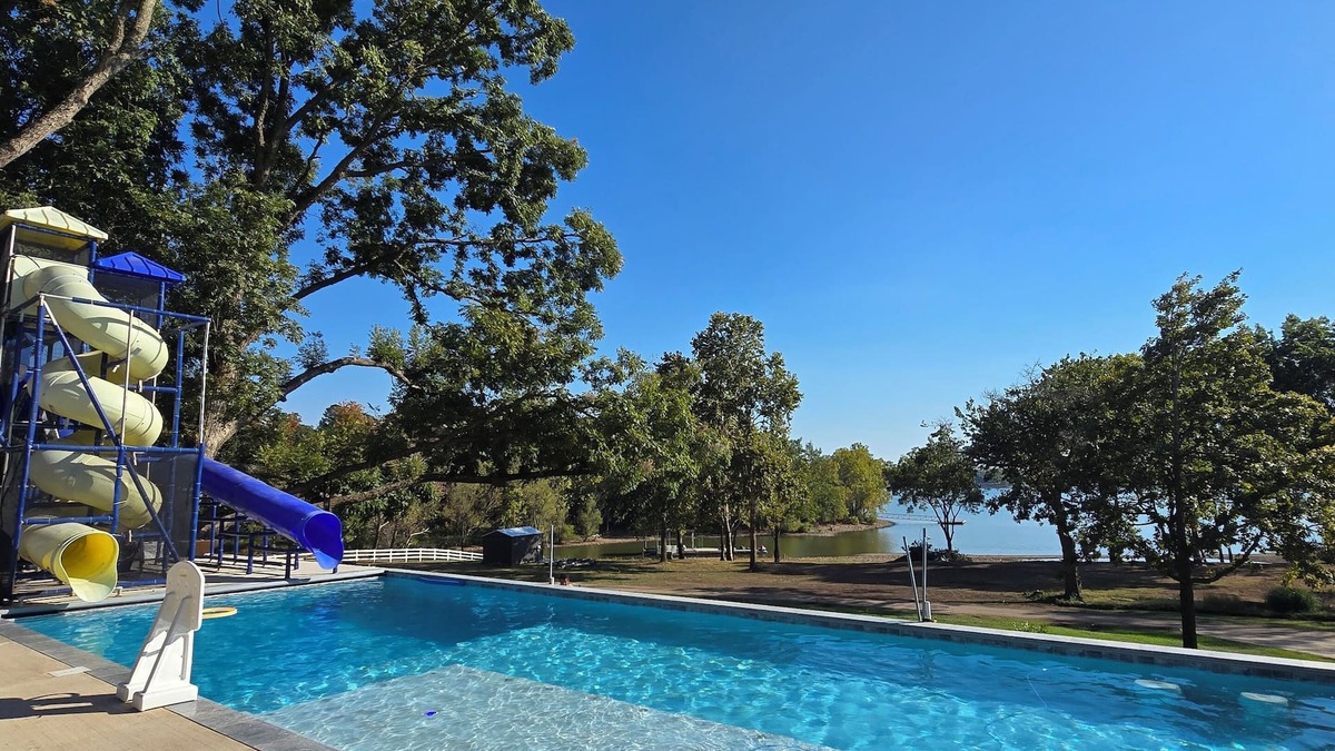 Grove House | Giant 10-bedroom lakefront home with large pool, hot tub, and dock