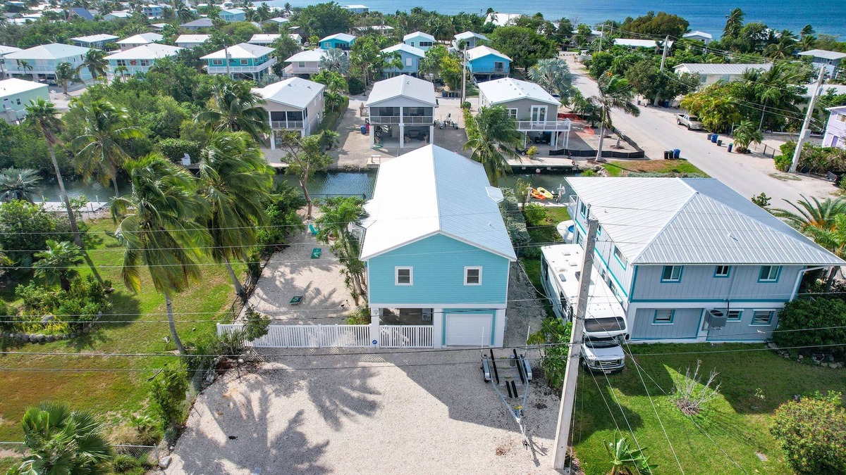 Cutthroat Harbor Estates House | Ginger's Paradise, 3 Bed, 2 Bath Canal Front Home in Cudjoe Key
