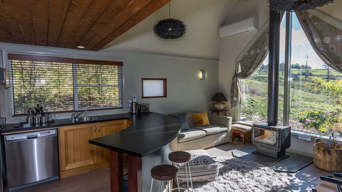 Tawonga South Ski Chalet | Glasshouse with log fire | pool | spa | near Bright | walk to shops restaurants