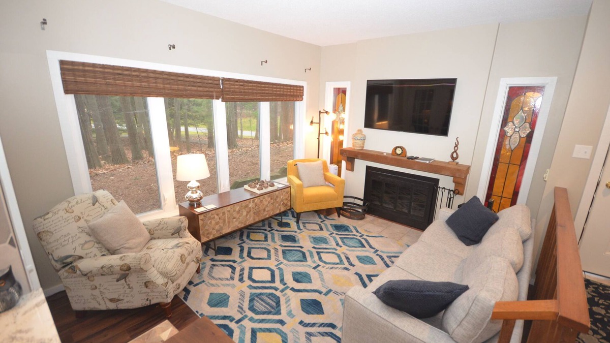 Maple City Condo | Glen Arbor condo in the woods w/screened porch, A/C, washer/dryer