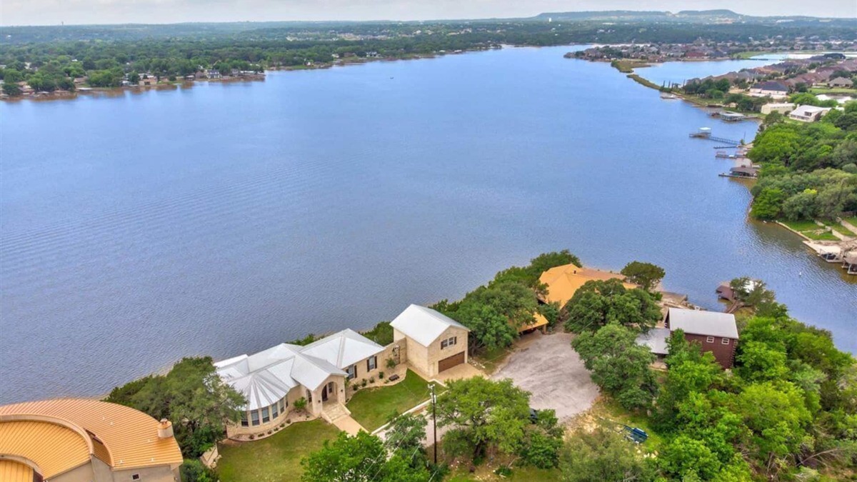 Granbury House | Gorgeous home with a view from every room with swim deck and boat dock