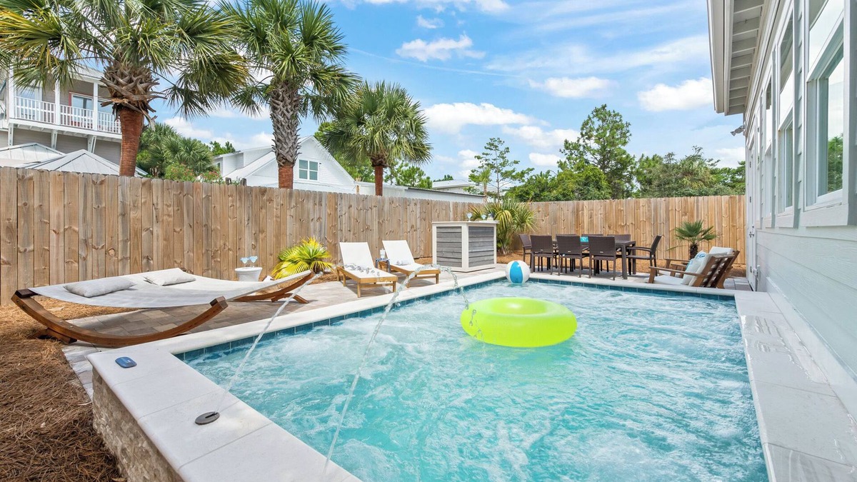 Village of Sugar Beach House | GorgeousNew! Seagove, steps, to beach sleeps 16, pool, sauna, entertainmnt deck