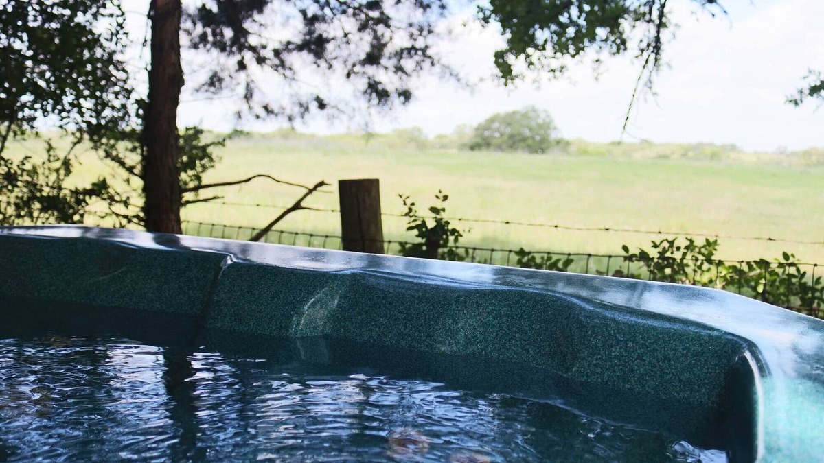 Brenham House | Grand Spa features Private Hot Tub, Shuffle Board, Disco Ball at Scenic Hill Retreat