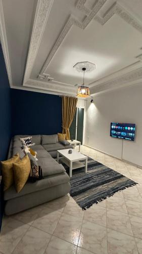 La Ville Haute Apartment | Gray Home in the city center