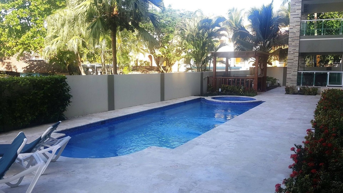 El Batey Apartment | Groundfloor 2BD 2BTH condo, guest-friendly, pool, near sandy beach/shops