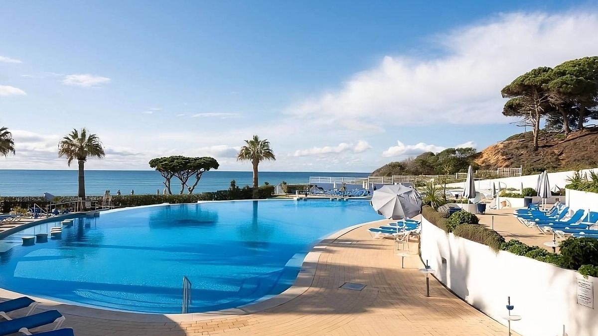 Oura Hotel | Group Getaway in Oura Beach! Four Sea View Units, Swimming Pools, Beachfront!