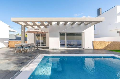 Charneca de Caparica e Sobreda House | GuestReady - Striking Hideaway in Almada