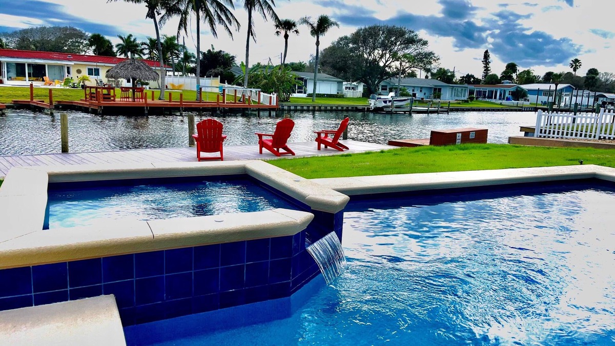Cocoa Isles House | Heated Pool and Spa-3B/2B Waterfront on Canal close to the Beach