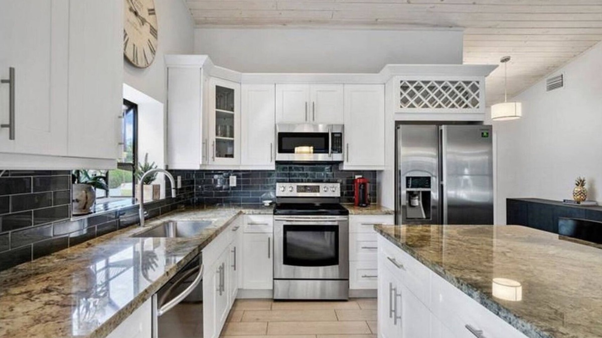 Lake Ida Shores House | Heated Saltwater Pool! Beautiful Activity Filled Three BR Home Downtown Delray