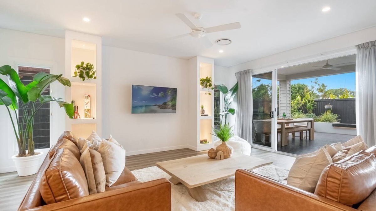 North Creek Apartment | Highlighted by a private outdoor entertaining space with a heated outdoor spa.