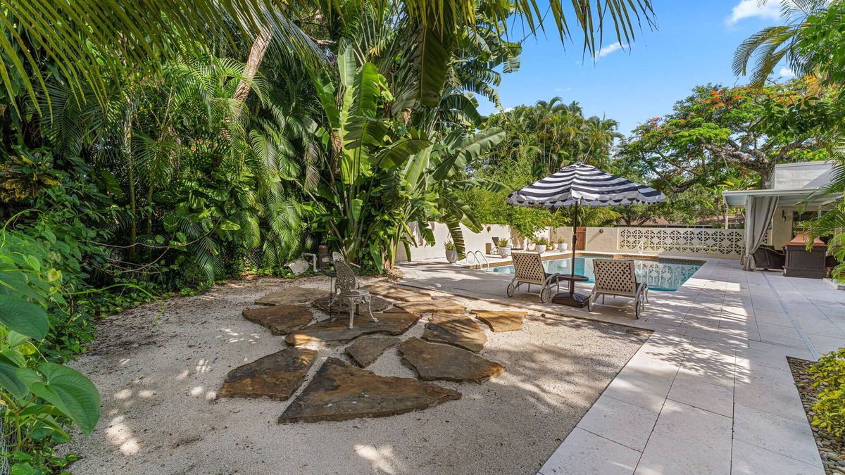 Valencia Terrace House | Historic 1920's spanish-style home just off Palm tree lined McGregor Blvd