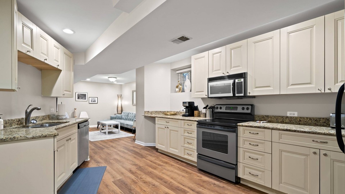 Sheffield and DePaul Condo | Historic Designer Lincoln Park Retreat Sleeps 14 by AllSet Turnover