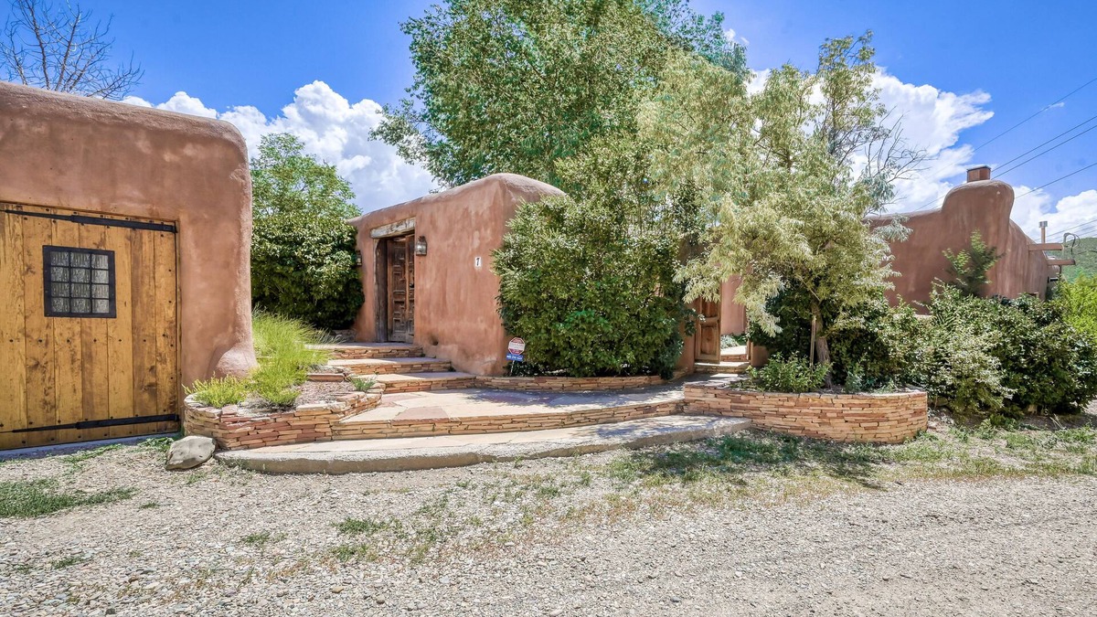 Taos House | Historic dog-friendly hacienda with 2 casitas, fireplaces, on-site hot tub, yoga