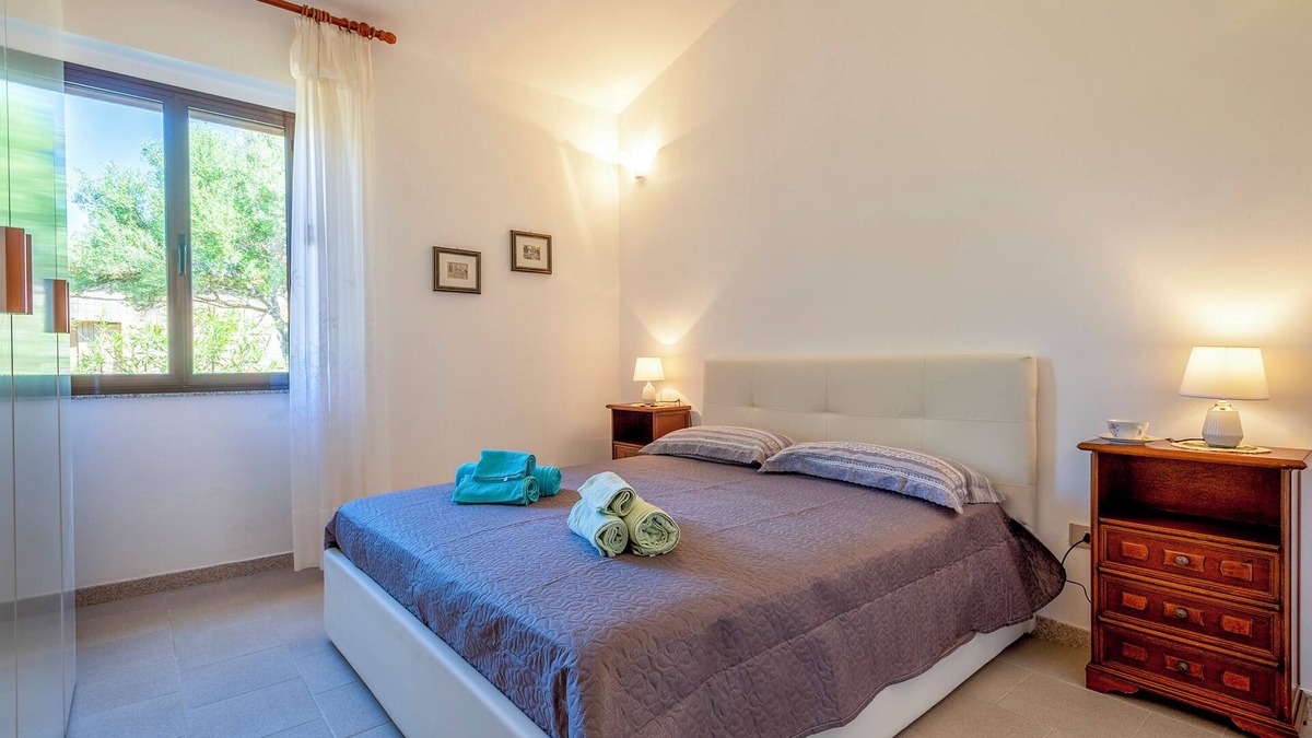Trinita d'Agultu e Vignola House | Holiday Home 'Rose's House' with Lateral Sea View, Private Terrace and Private Garden