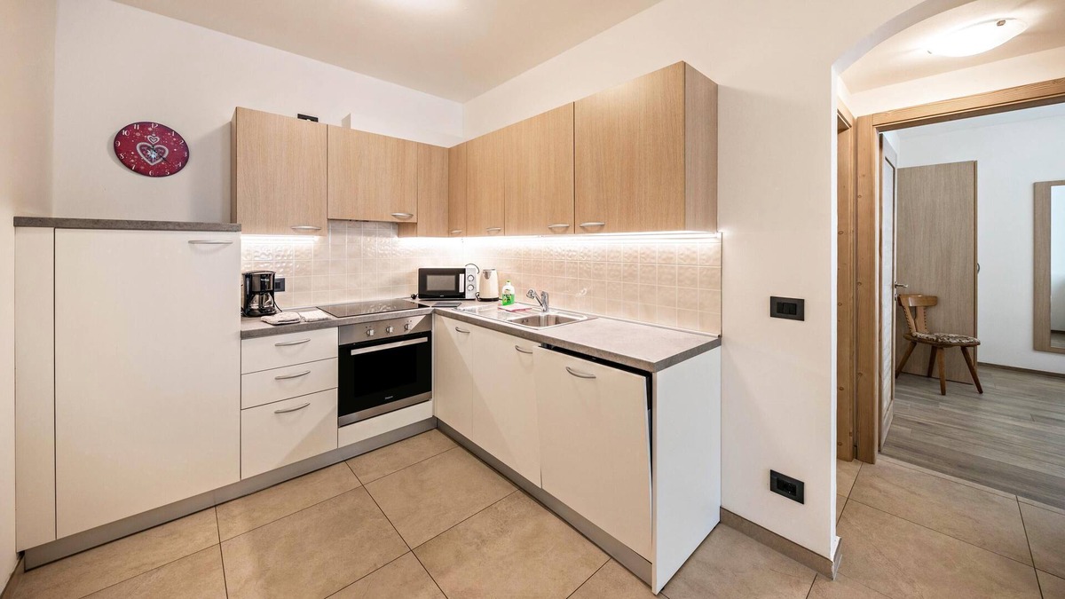 Campitello di Fassa Apartment | Holiday Apartment “Appartamenti Stefan Nigola” with Shared Terrace & Wi-Fi; Parking Available, Pets Allowed