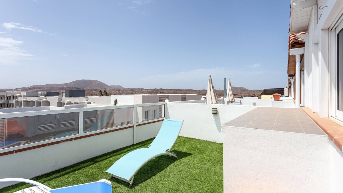 Corralejo Apartment | Holiday Apartment "Atico Casapueblo" Near the Beach with Mountain View