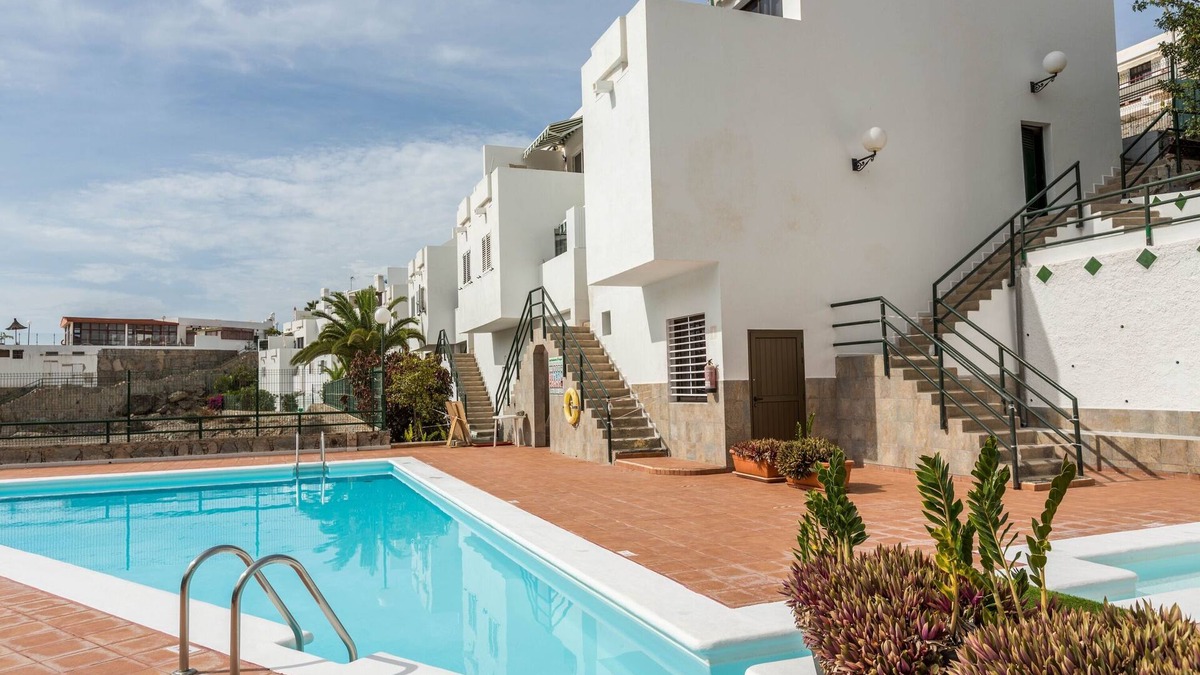 Puerto Rico Apartment | Holiday Apartment 'Casa Luca' with Wi-Fi, Terrace & Shared Pool