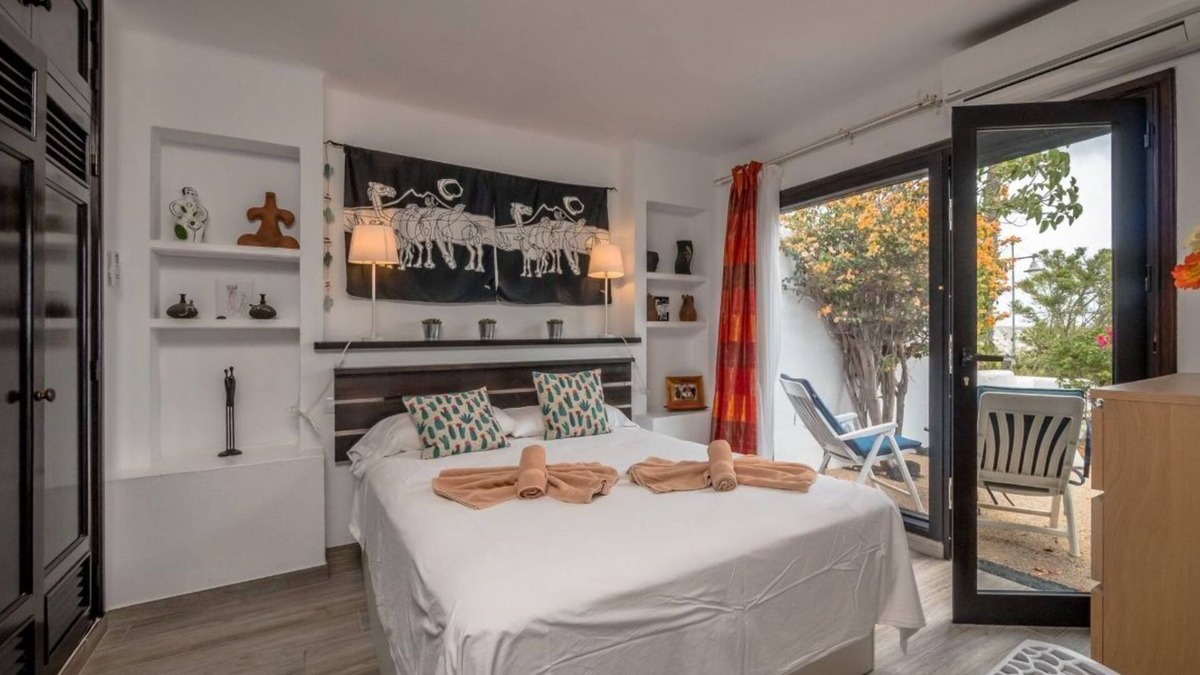 Playa Blanca Apartment | Holiday Apartment "Puerto Chico I & J" with Sea Views, Private Terrace, Shared Pool & WiFi