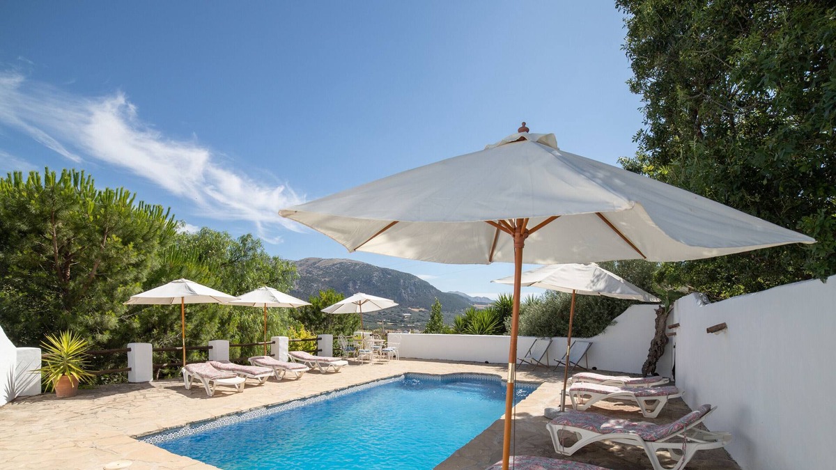 Villanueva del Trabuco Apartment | Holiday home "Cortijo Los Lobos Mountain Retreat" with communal pool and WiFi