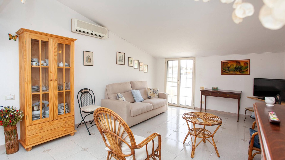 La Caletta House | Holiday home Apartment Mansarda La Caletta with A/C & Terrace