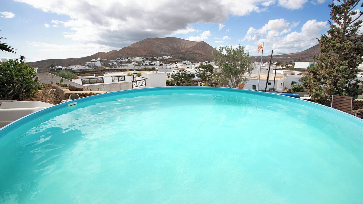 Guatiza House | Holiday Home Casa Consultorio with Mountain View, Pool, Wi-Fi & Terrace