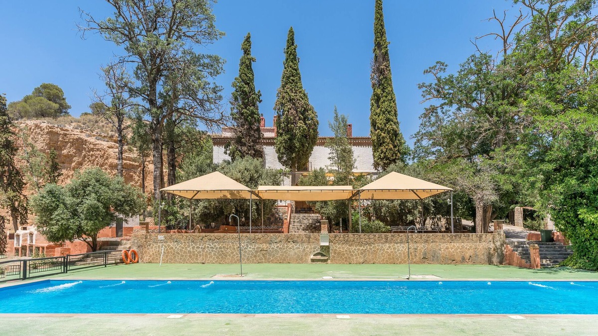 Guadix House | Holiday Home 'Cueva Agua' with Mountain View, Shared Pool and Wi-Fi