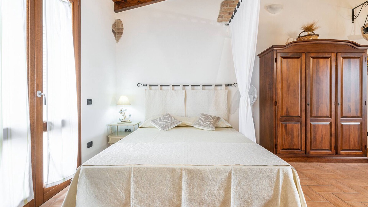 Sant'Antioco House | Holiday Home "Dependance Dei Ginepri" with Sea View, Terrace & Wi-Fi