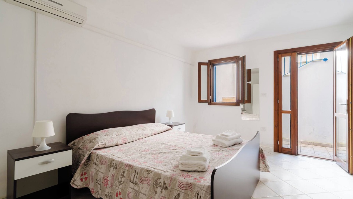 Porto Cesareo House | Holiday Home 'Mery Villaggio Chiusurelle 2' with Shared Pool, Shared Terrace and Air Conditioning