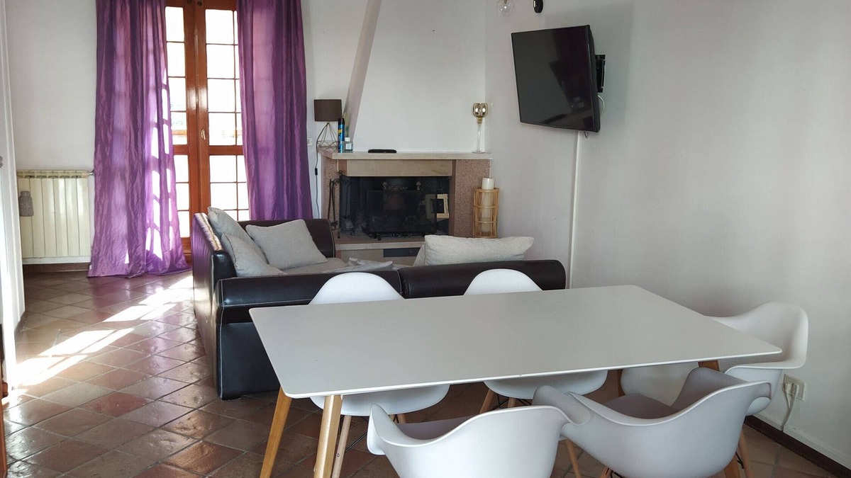 Nettuno House | Holiday Home 'Villetta Indipendente' with Private Terrace, Wi-Fi and Air Conditioning