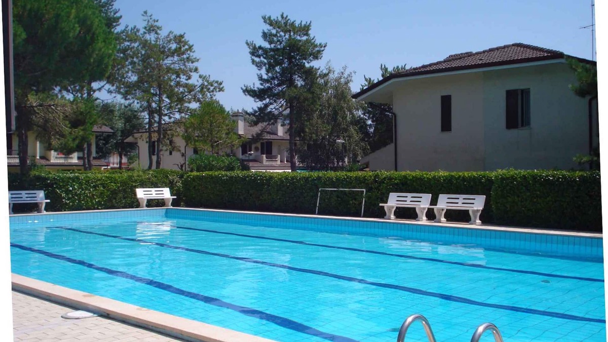 Porto Santa Margherita House | Holiday home with outdoor swimming pool and terrace