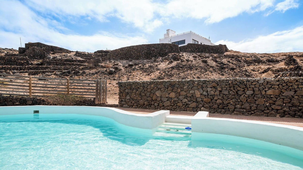 Haria Villa | Holiday Villa 'Playa Marina Eco Beach' with Sea Views, Shared Pool and Wi-Fi
