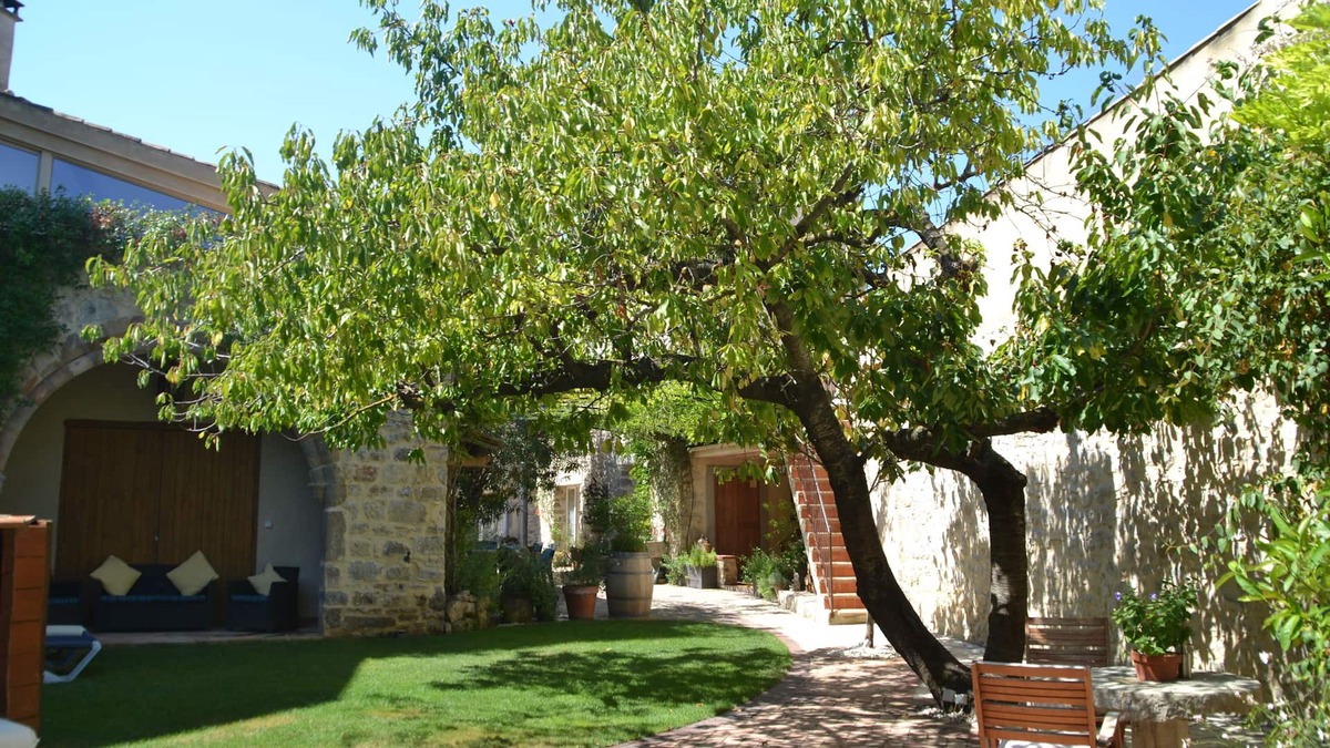 Lagrasse Apartment | Holidays in Lagrasse. Stunning medieval apartment set in walled garden with pool