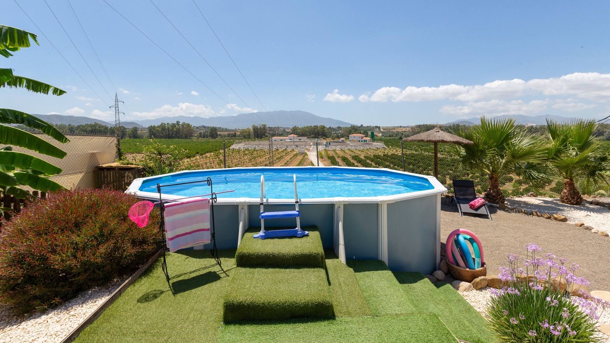 Pizarra Villa | HOME BENITEZ COUNTRY - Cozy country home with private above ground pool. Wifi free